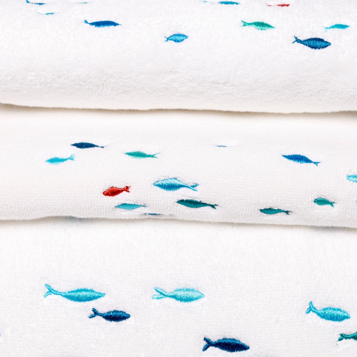 Cotton bath linen with embroidered fish
