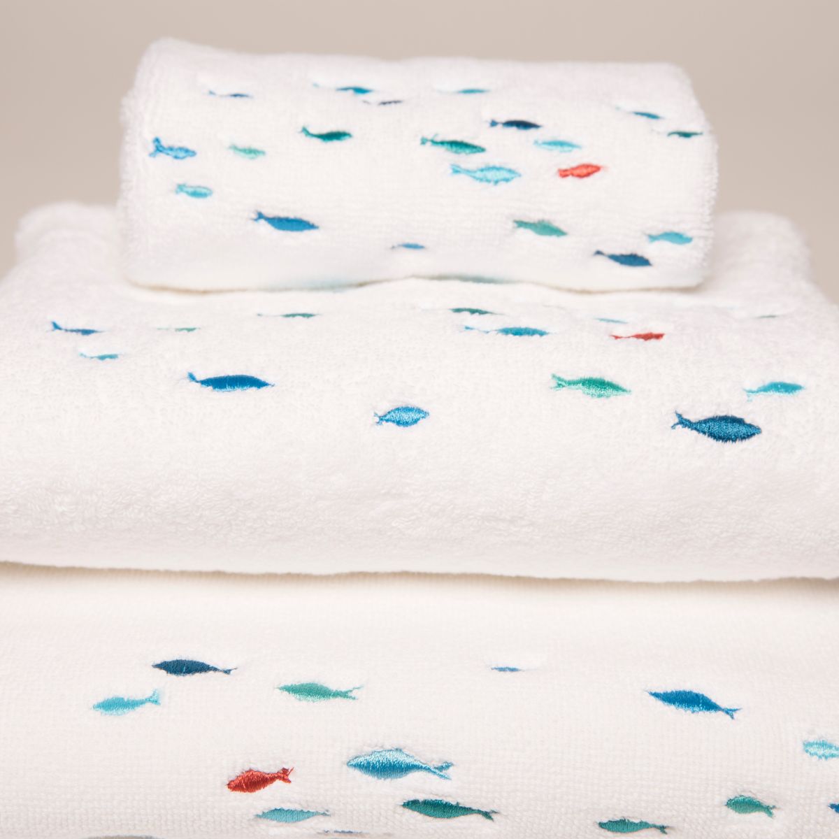 Cotton bath linen with embroidered fish