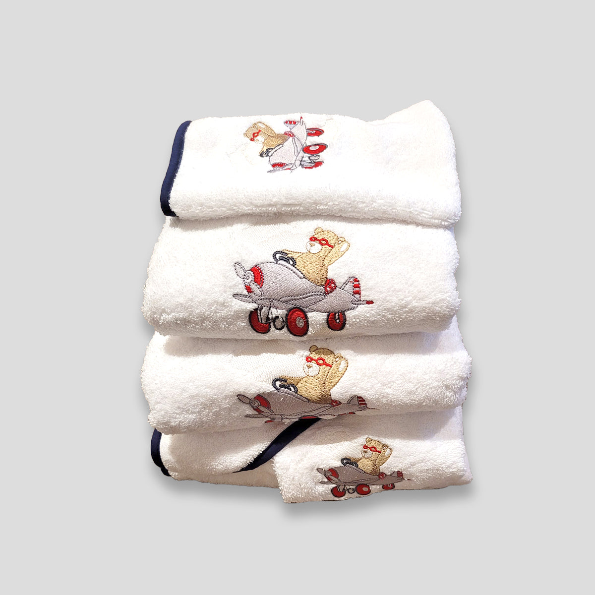 Linge de bain pour bébé en coton peigné avec broderie ours en avion