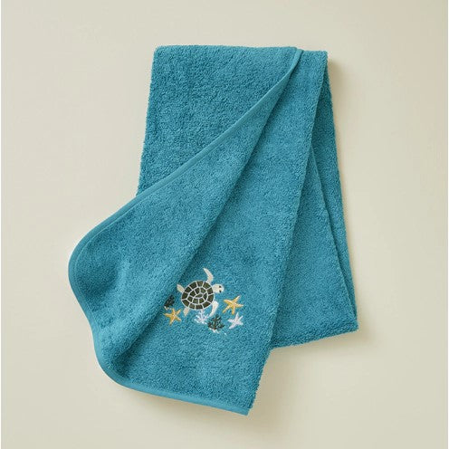 Combed cotton baby bath linen with embroidered fish