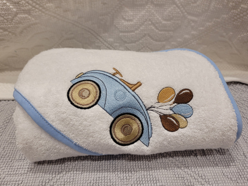 Combed cotton baby bath linen with embroidered elephant