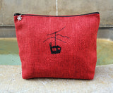 Trousse de toilette en tweed sérigraphiée