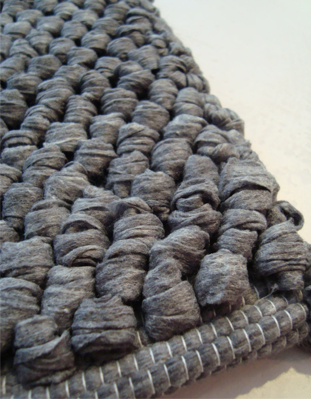 Tapis en fibres recyclées