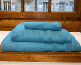 White bath towels with a heart embroidered with Snowflakes