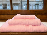 White bath towels with a heart embroidered with Snowflakes