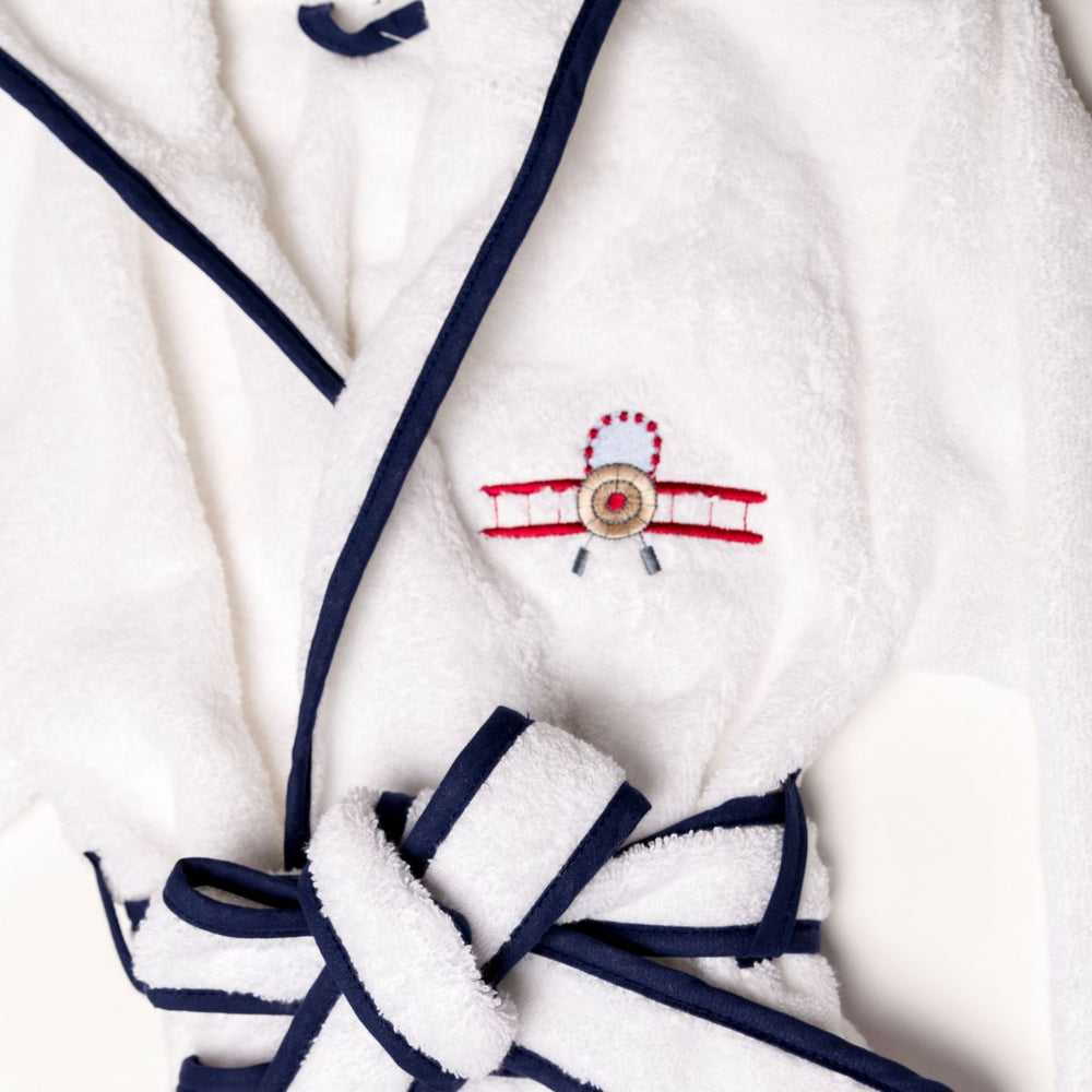 Children's bathrobe with hood in combed cotton with embroidered airplane